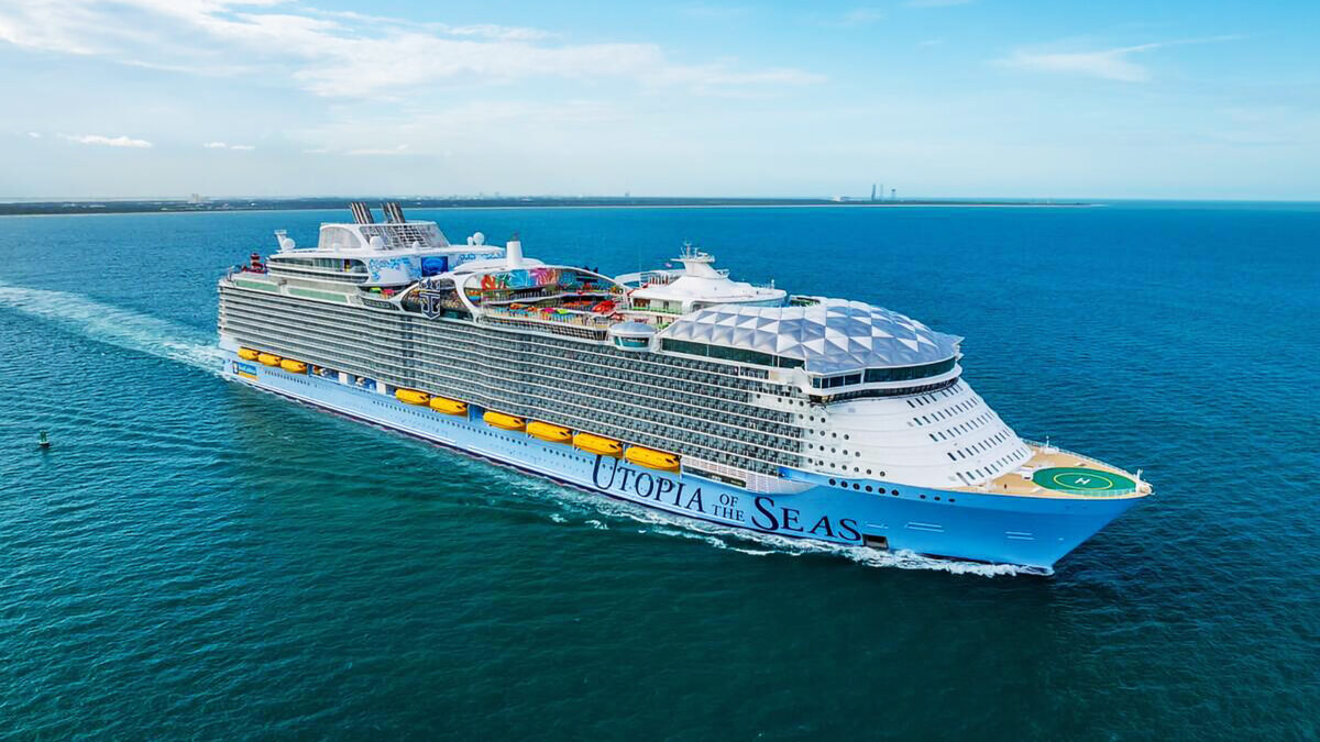 Cruise ship sailing at sunset